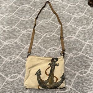 Beige Anchor canvas Crossbody Bag with Striped Lining and adjustable strap.
